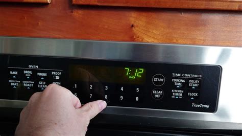 how to set clock on a ge profile stove